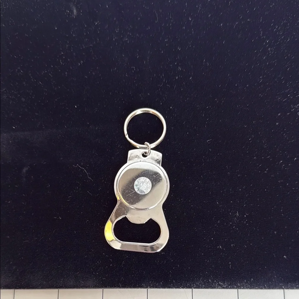 Oakland Raiders Silver Keychain Bottle Opener